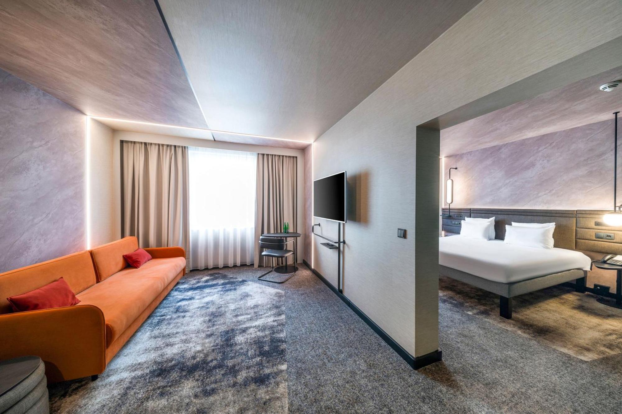 Executive Suite met Tweepersoonsbed en Slaapbank