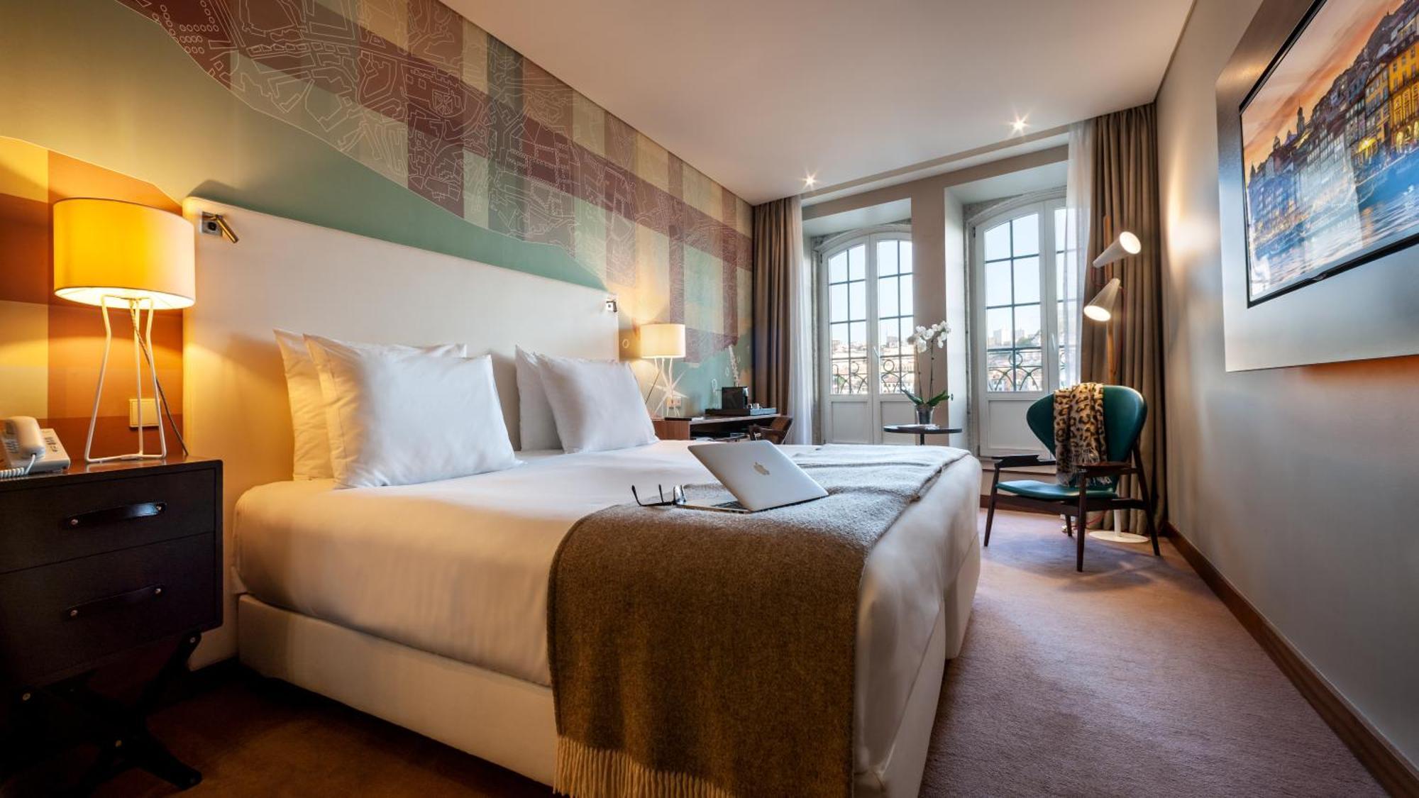 Tweepersoonskamer met 1 of 2 Bedden - Uitzicht op de Rivier en Balkon