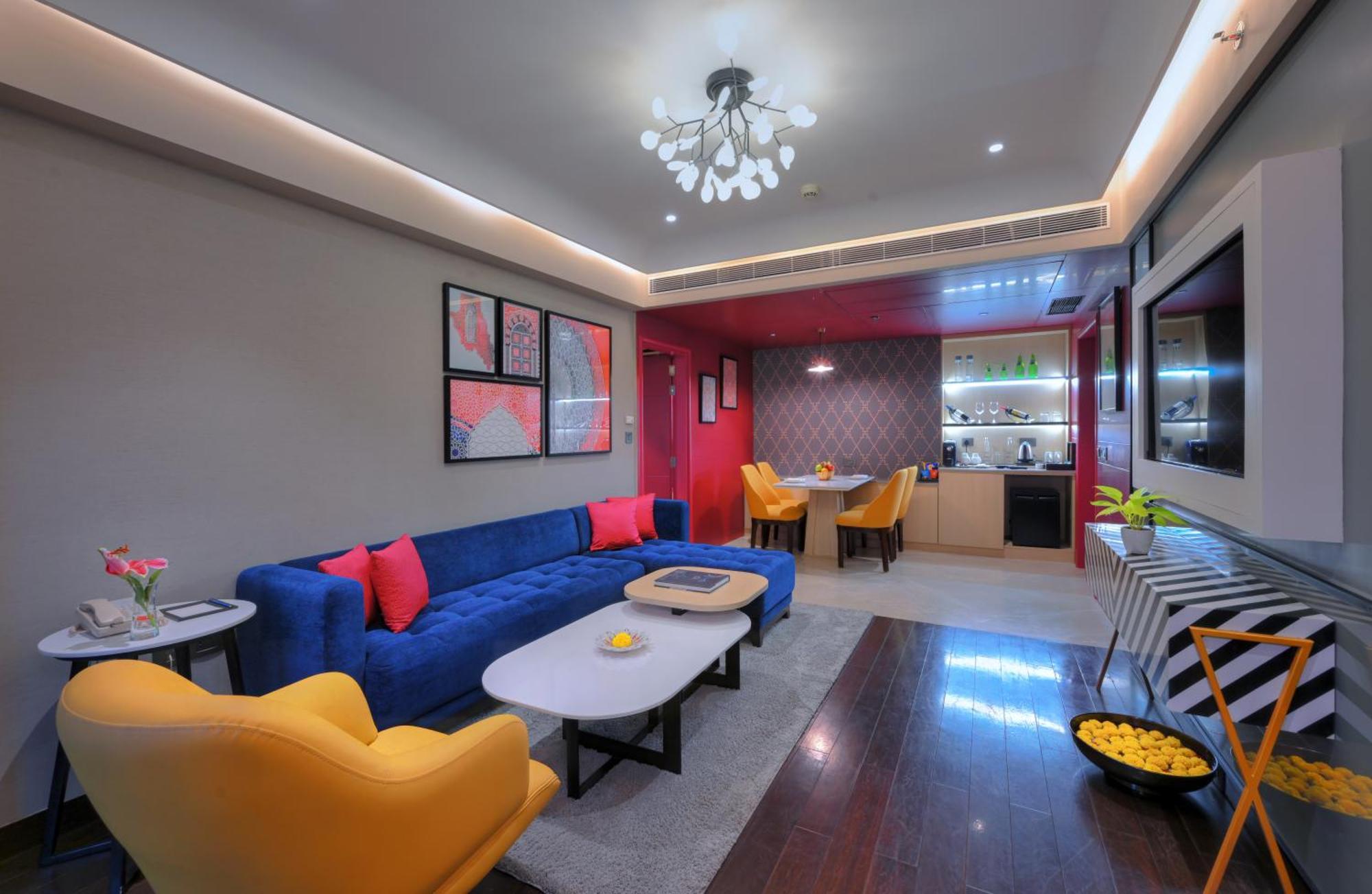 Executive Suite Room seating area terrace on food beverage spa laundry | 11 IMFL Happy Hours from 6 to 8 pm