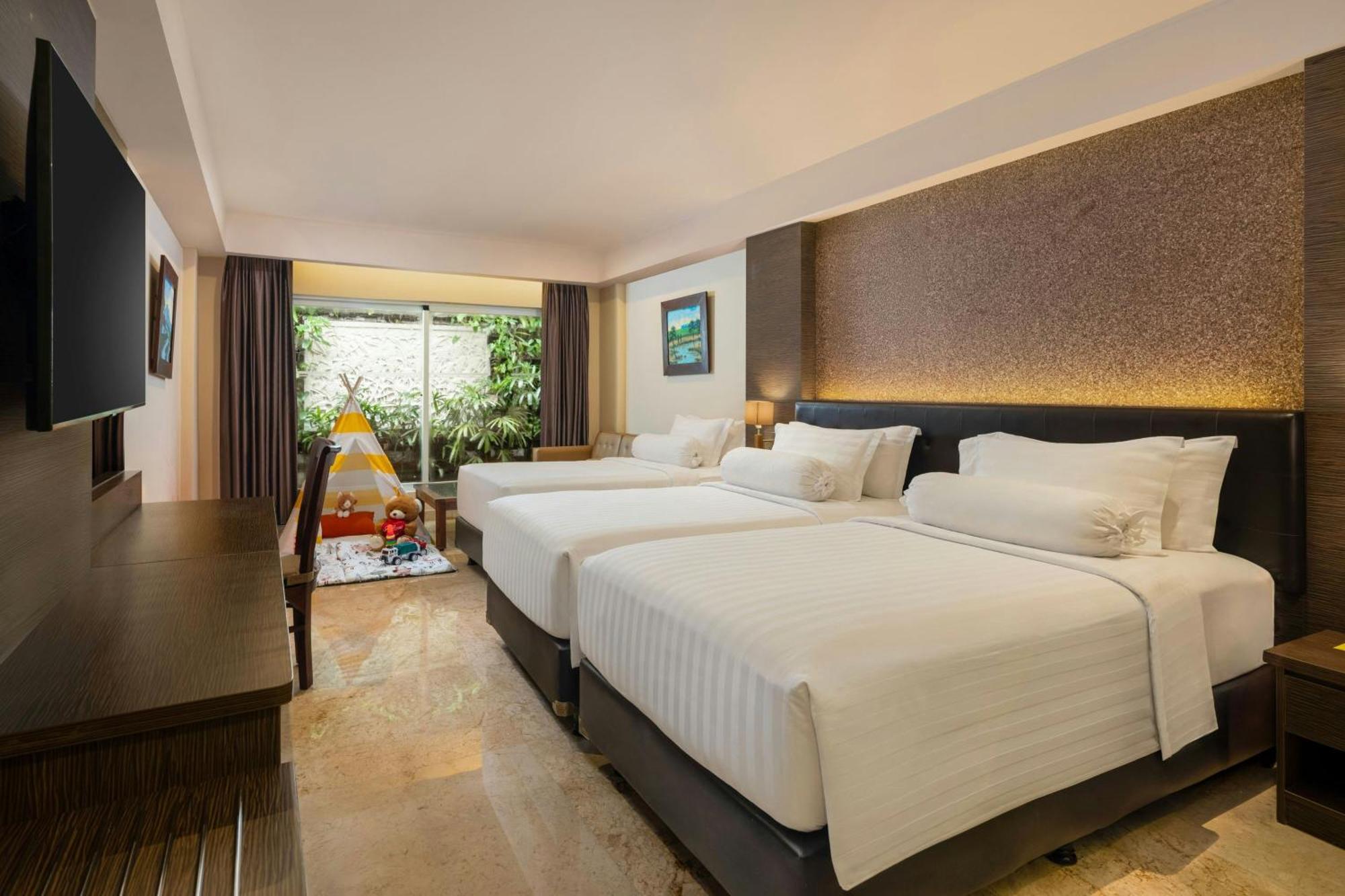 Deluxe Family Twin Room, with FREE daily shuttle to Ubud City, FREE Photo Session, FREE Art Gallery Visit, 24-hour access to Fitness Center, FREE Welcome Drink, and FREE Kids Activities.