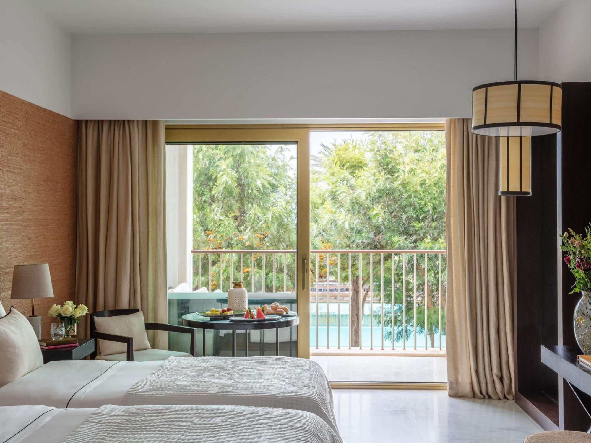 Deluxe Twin Room Balcony Pool View