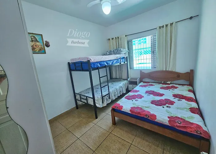 Cabana: Casa Praia Grande WIFI 3dorm 2ban 2carr churrasq 400mts da praia Tupi